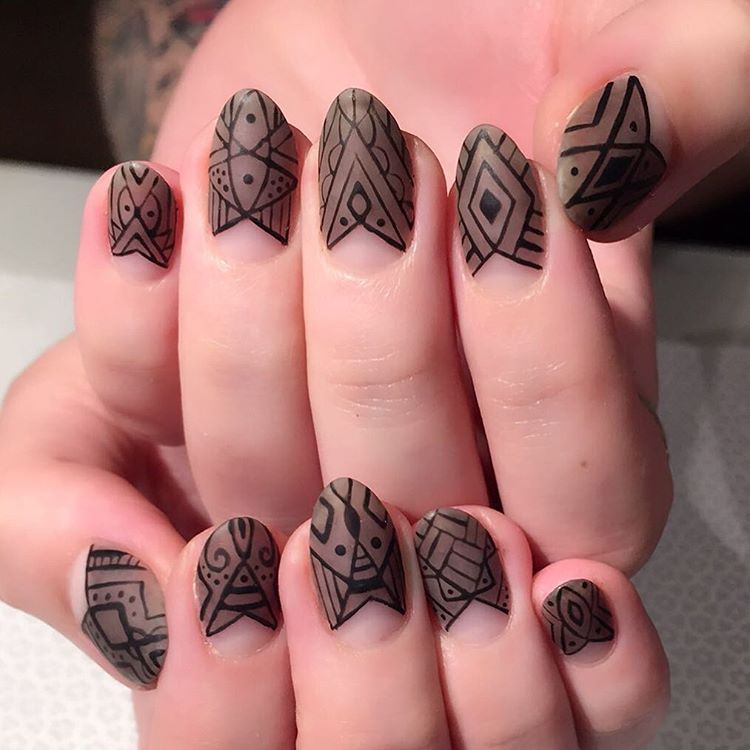 <p>Tape off your half moon in a triangle shape. Paint a taupe matte polish and let dry. Use a thin brush to add linear details.</p><p>Design by <a href="https://www.instagram.com/p/BHUboYAhdef/" target="_blank">@vanityprojects</a></p>
