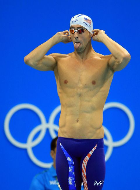 Swimmer, Cap, Elbow, Joint, Chest, Standing, Swim cap, Electric blue, Goggles, Muscle, 