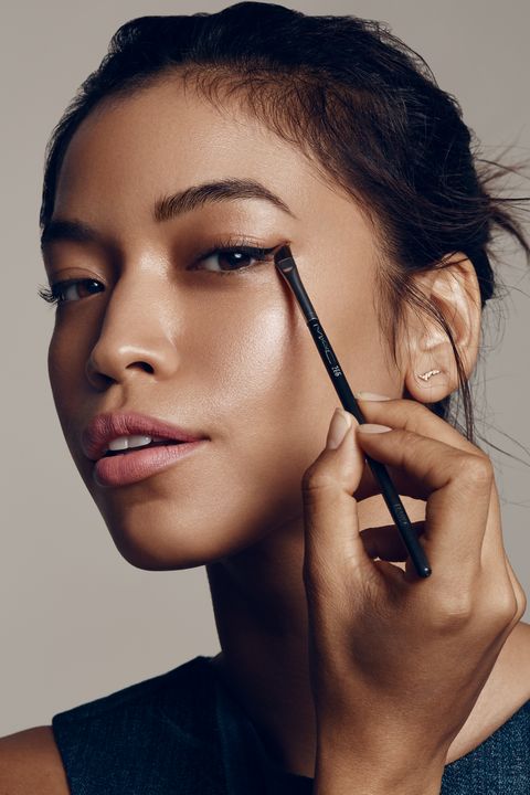 <p>Anyone who's tried a winged eye has agonized over the angle and symmetry. Park's stamping trick nails it in seconds: Dip an angled eyeliner brush into a gel liner and, with your eyes open, stamp a line that follows the same angle as your lower lash line. "The stamp gives an anchor to the shape, so you know each side will be even," says Park. Sketch a line from the outer corner of the stamp in toward your upper lash line—the thicker and more exaggerated the line, the further toward your inner corner the liner should go. To keep it current and graphic, don't trace your entire upper lash line, advises Park. </p>