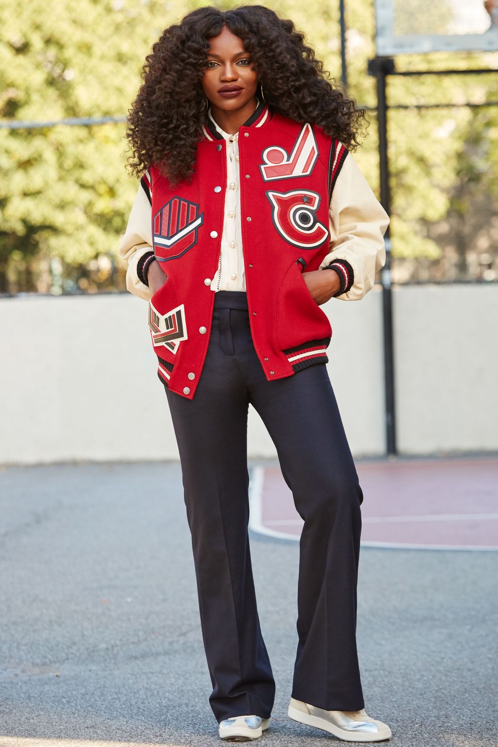 <p>For a touch of nostalgia, pair straight-leg trousers with sneakers. "It's a combo I call 'tomgirl-chic,'" explains Gold. "It reminds me of my glory days in high school when I played basketball, but it's actually timeless—you can wear this look forever." Up the femme factor by choosing a blouse with pretty details, like pearly buttons. "I love pearls. They're simple and elegant and&nbsp;go with everything."
</p><p><br>
</p><p><em data-redactor-tag="em">Coach <em data-redactor-tag="em">1941 </em><span class="redactor-invisible-space" data-verified="redactor" data-redactor-tag="span" data-redactor-class="redactor-invisible-space"></span>Oversized Varsity Jacket, $1,195, <a rel="noskim" href="http://www.coach.com/coach-designer-vest-oversized-varsity-jacket/56368.html?CID=D_B_ELL_11729" target="_blank">coach.com</a>;</em><em data-redactor-tag="em"> </em><em data-redactor-tag="em">Coach <em data-redactor-tag="em">1941 </em><span class="redactor-invisible-space" data-verified="redactor" data-redactor-tag="span" data-redactor-class="redactor-invisible-space"></span>Shirt With Ruffle, $450, <a rel="noskim" href="http://www.coach.com/coach-designer-tops-shirt-with-ruffle-/56450.html?CID=D_B_ELL_11730" target="_blank">coach.com</a>; Coach <em data-redactor-tag="em">1941 </em><span class="redactor-invisible-space" data-verified="redactor" data-redactor-tag="span" data-redactor-class="redactor-invisible-space"></span>Tailored Pants, $395, <a rel="noskim" href="http://www.coach.com/coach-designer-pants-tailored-pants/56306.html?CID=D_B_ELL_11731" target="_blank">coach.com</a>; Coach <em data-redactor-tag="em">1941 </em><span class="redactor-invisible-space" data-verified="redactor" data-redactor-tag="span" data-redactor-class="redactor-invisible-space"></span>C213 High Top Sneaker, $350, </em><a rel="noskim" href="http://www.coach.com/coach-designer-sneakers-c213-high-top-sneaker/Q8922.html?CID=D_B_ELL_11732" target="_blank"><em data-redactor-tag="em">coach.com</em></a></p>