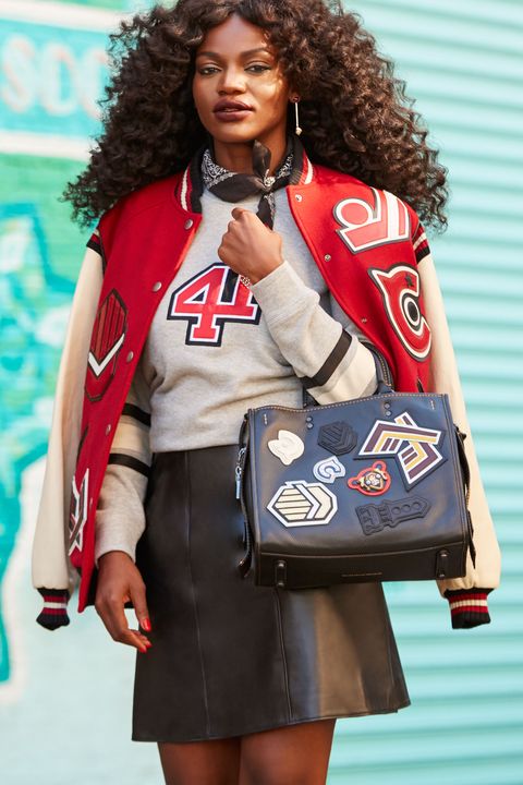 <p>A varsity jacket is laid-back by default, so to avoid looking sloppy, Gold balances it with other pieces that impart edgy elegance, like a leather skirt. "Ankle boots keep the skirt casual," she adds. "They're functional, but polished." Gold also recommends topping the skirt with a cozy sweatshirt and skipping statement jewelry. "Tie a bandana around your neck instead," she says. "You'll look like a rock star—like you're <em data-redactor-tag="em">in</em> the band."
</p><p><br>
</p><p><em data-redactor-tag="em">Coach 1941 Oversized Varsity Jacket, $1,195, <a rel="noskim" href="http://www.coach.com/coach-designer-vest-oversized-varsity-jacket/56368.html?CID=D_B_ELL_11733" target="_blank">coach.com</a>; Coach <em data-redactor-tag="em">1941 </em><span class="redactor-invisible-space" data-verified="redactor" data-redactor-tag="span" data-redactor-class="redactor-invisible-space"></span>Embellished 41 Sweatshirt, $350, <a rel="noskim" href="http://www.coach.com/coach-designer-tops-embellished-41-sweatshirt/57140.html?CID=D_B_ELL_11734" target="_blank">coach.com</a>; Coach <em data-redactor-tag="em">1941 </em><span class="redactor-invisible-space" data-verified="redactor" data-redactor-tag="span" data-redactor-class="redactor-invisible-space"></span>Leather A-Line Skirt, $695, <a rel="noskim" href="http://www.coach.com/coach-designer-pants-leather-a-line-skirt/56692.html?CID=D_B_ELL_11735" target="_blank">coach.com</a>; <em data-redactor-tag="em">Coach <em data-redactor-tag="em">1941 </em><span class="redactor-invisible-space" data-verified="redactor" data-redactor-tag="span" data-redactor-class="redactor-invisible-space"></span>Chelsea Boot, $575, </em><em data-redactor-tag="em"><a rel="noskim" href="http://www.coach.com/coach-designer-booties-chelsea-boot/Q8919.html?CID=D_B_ELL_11736" target="_blank">coach.com</a>;</em> Coach <em data-redactor-tag="em">1941 </em><span class="redactor-invisible-space" data-verified="redactor" data-redactor-tag="span" data-redactor-class="redactor-invisible-space"></span>Varsity Patch Rogue Bag, $895, <a rel="noskim" href="http://www.coach.com/coach-designer-purses-varsity-patch-rogue-bag-in-pebble-leather/57231.html?CID=D_B_ELL_11737" target="_blank">coach.com</a></em>
</p><p><em data-redactor-tag="em"></em></p>