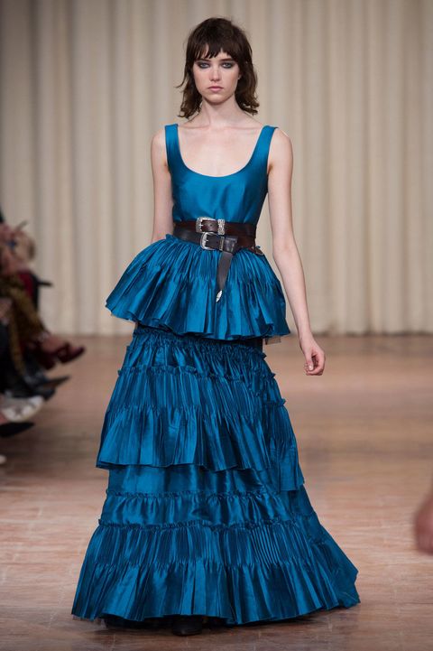 Blue, Dress, Shoulder, Floor, Flooring, Formal wear, Style, Fashion model, One-piece garment, Waist, 