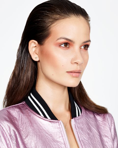 <p>Lledo re-created this high-impact look by prepping the entire eyelid with a primer (like <a href="http://www.ulta.com/stay-dont-stray-eyeshadow-primer?productId=xlsImpprod1840041" target="_blank" data-tracking-id="recirc-text-link">Nars Smudge Proof Eyeshadow Base</a>, $26) then pressing a translucent burnt orange shadow (try <a href="http://www1.macys.com/shop/product/mac-eye-shadow-0.05-oz?ID=106344" target="_blank" data-tracking-id="recirc-text-link">MAC's Red Brick</a>, $16) into the top crease and along the lower lashes.</p><p>To keep the look wearable for day, Lledo suggests starting with just a small amount of shadow. "Build the color until you get the intensity you want, then blend the edges," he advises. Finish with black mascara on the top and bottom lashes to make the whites of the eye pop.</p>