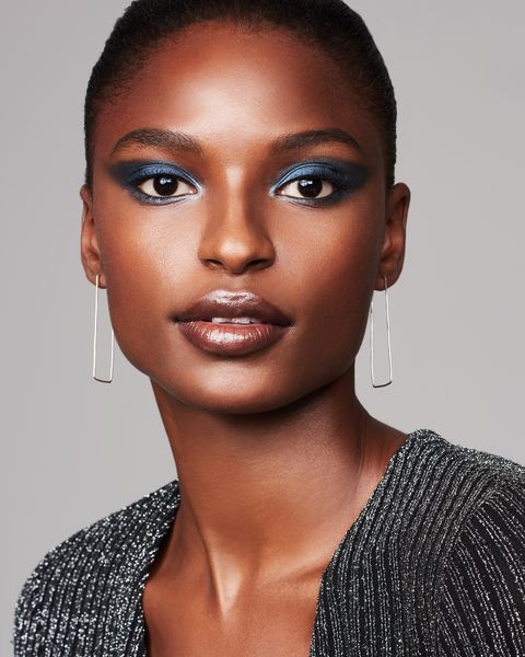 <p>With a bold eye, "piles of mascara" are in order, says Melluso. Give skin a soft dewiness with a liquid highlighter and lips a neutral glaze with a balm or gloss. "A bold smokey eye is the ultimate evening makeup look," she says. "The lustre effect makes it instantly more flattering." </p>