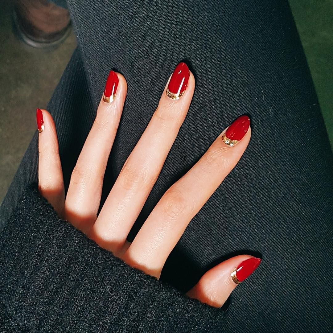 dark red nails with gold