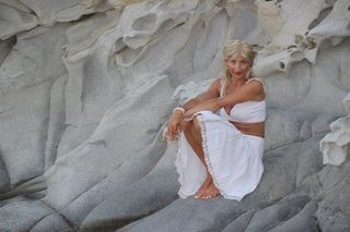 Nose, Beauty, Blond, Gown, Photo shoot, Stomach, Sand, Abdomen, Model, Foot, 