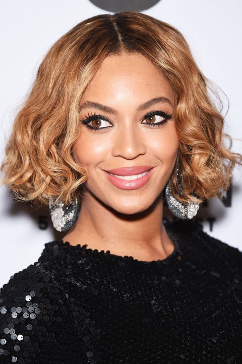 <p>Queen Bey's faded bob swiftly transitions from her dark roots into to a honeyed blonde at the crown of her head. </p>