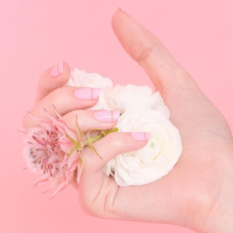 <p>We're still in love with the negative nail trend, and it looks even sweeter in baby pink. Simply add a strip of thin tape horizontally, then paint over in your favorite lacquer. Wait until tacky, then remove the tape. Once the color is completely dry, finish the look with a clear top coat.</p>

<p>Design by <a href="https://www.instagram.com/p/BMh7X-wAwJO/">@paintboxnails</a>  </p>