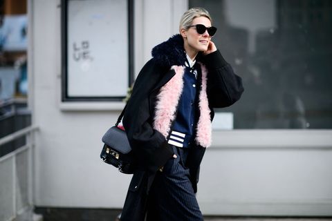 <p>
Wearing&nbsp;a small jacket under a heavy coat is an easy, but not necessarily&nbsp;obvious way to stay warm. Add texture and dimension to your look by mixing materials, like&nbsp;pairing a varsity jacket with a&nbsp;fuzzy coat.&nbsp;</p><p><span class="redactor-invisible-space" data-verified="redactor" data-redactor-tag="span" data-redactor-class="redactor-invisible-space"></span></p>