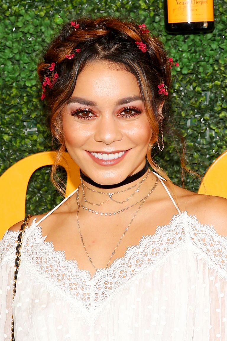 <p>Vanessa Hudgens, a modern-day&nbsp;flower child, gave this braid crown&nbsp;a sweet touch with the addition of delicate&nbsp;flowers placed throughout.&nbsp;</p>