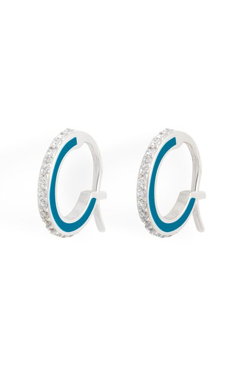 <p>
Raphaele Canot Skinny Deco Mini Hoops; for more information visit <a href="http://www.raphaelecanot.com/index.php/collections/skinny-deco/skinny-deco-small-creoles-white-gold-blue-enamel/">raphaelcanot.com</a></p><p><span class="redactor-invisible-space" data-verified="redactor" data-redactor-tag="span" data-redactor-class="redactor-invisible-space"></span></p>