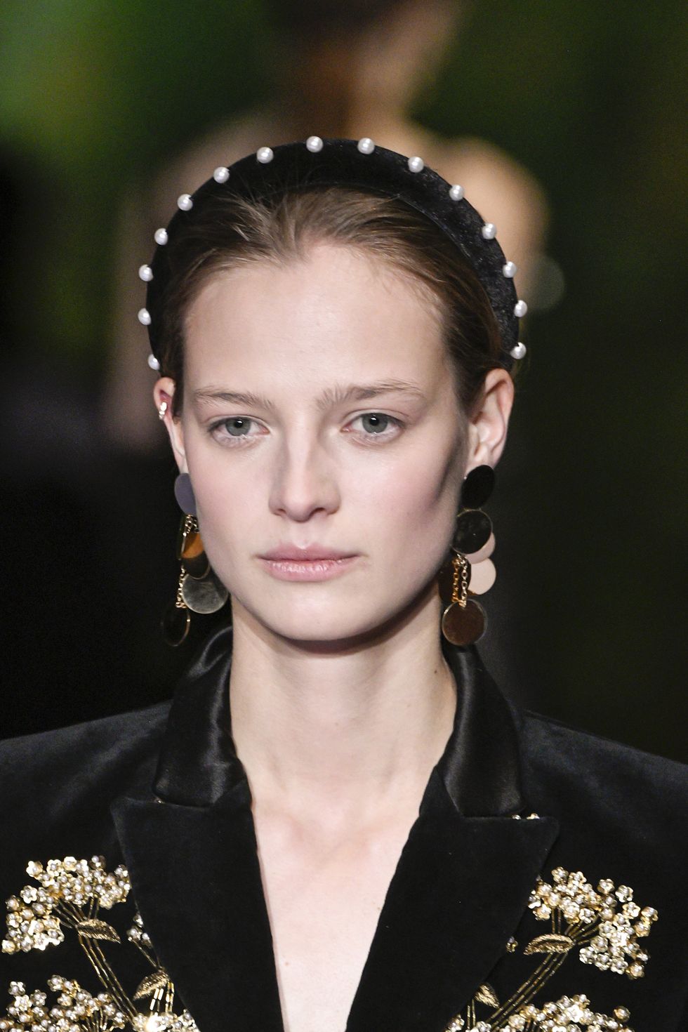 <p>With some top notes of Vermeer. A large contingent of commenters ran screaming from the '80s-ness of it all, but we think with the right, smart outfit, and those earrings, a pearl headband could be really elegant. &nbsp;&nbsp;</p>