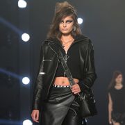 Jacket, Latex, Leather, Fashion, Leather jacket, Black hair, Fashion model, Belt, Goth subculture, Fashion design, 