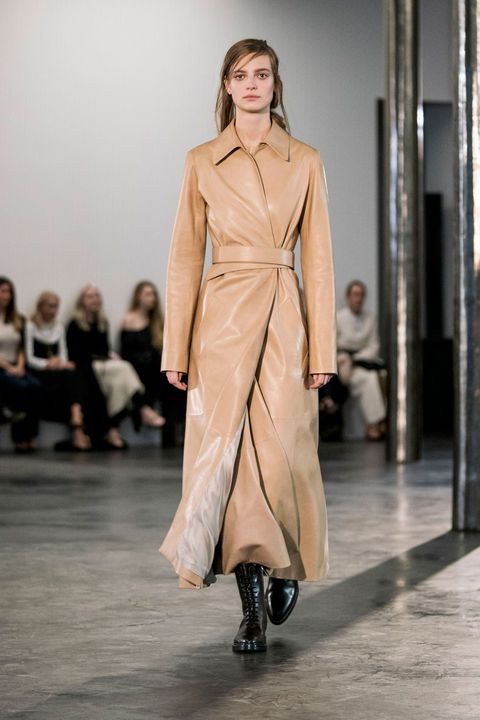 Clothing, Footwear, Fashion show, Brown, Shoulder, Runway, Joint, Outerwear, Fashion model, Style, 