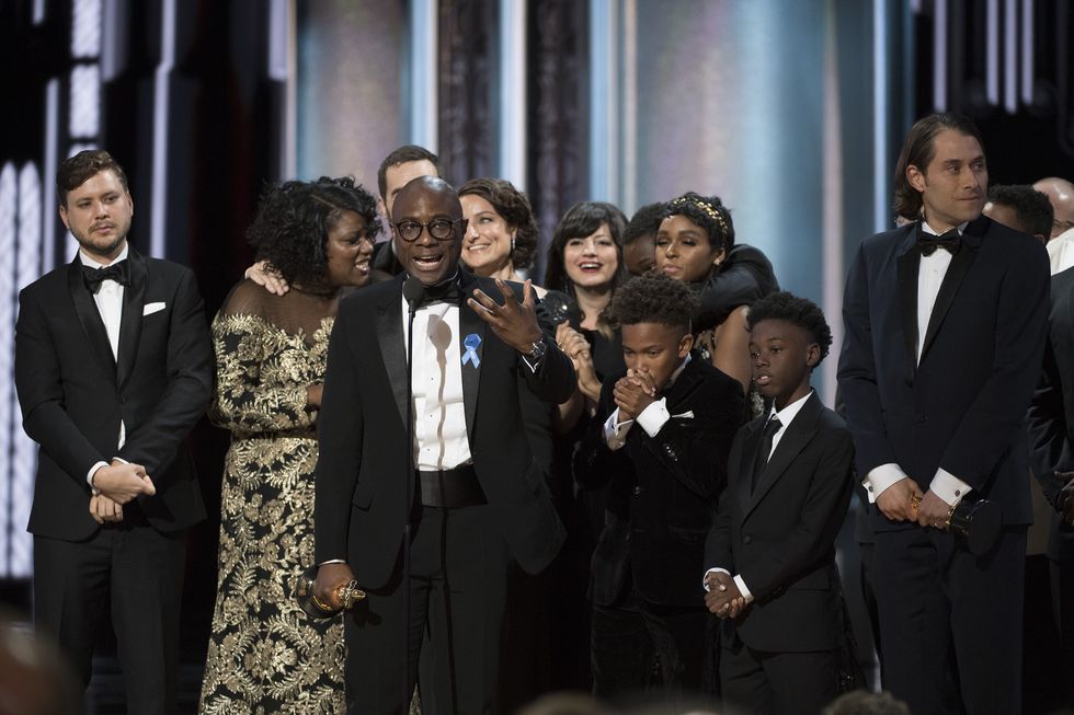 Director Barry Jenkins and the 'Moonlight' cast and crew accepting the Academy Award for Best Picture
