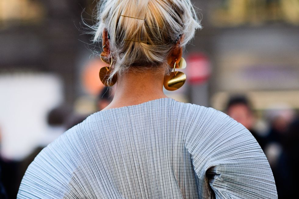 Ear, Earrings, Hairstyle, Style, Street fashion, Jewellery, Sweater, Blond, Hair coloring, Chignon, 