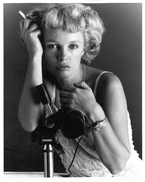 Suze Randall with camera