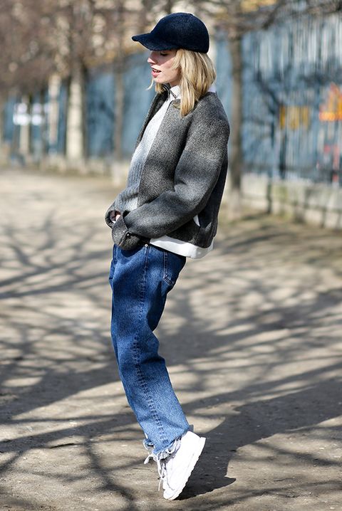 <p>Distressed, faded jeans have a lived-in appearance that appeals to <a href="http://www.cuillere-a-absinthe.fr/" target="_blank" data-tracking-id="recirc-text-link">Augusto</a>'s low-key, vintage-inspired aesthetic (regularly chronicled at <a href="http://www.cuillere-a-absinthe.fr/" target="_blank" data-tracking-id="recirc-text-link">Cuillère à Absinthe</a>). "I only wear really modern pieces with them," Augusto explains. "A chic blouse contrasts the ripped look, and mules are the It shoes of 2017." Rounded out with a classic chainstrap bag, what's old feels new again.</p>