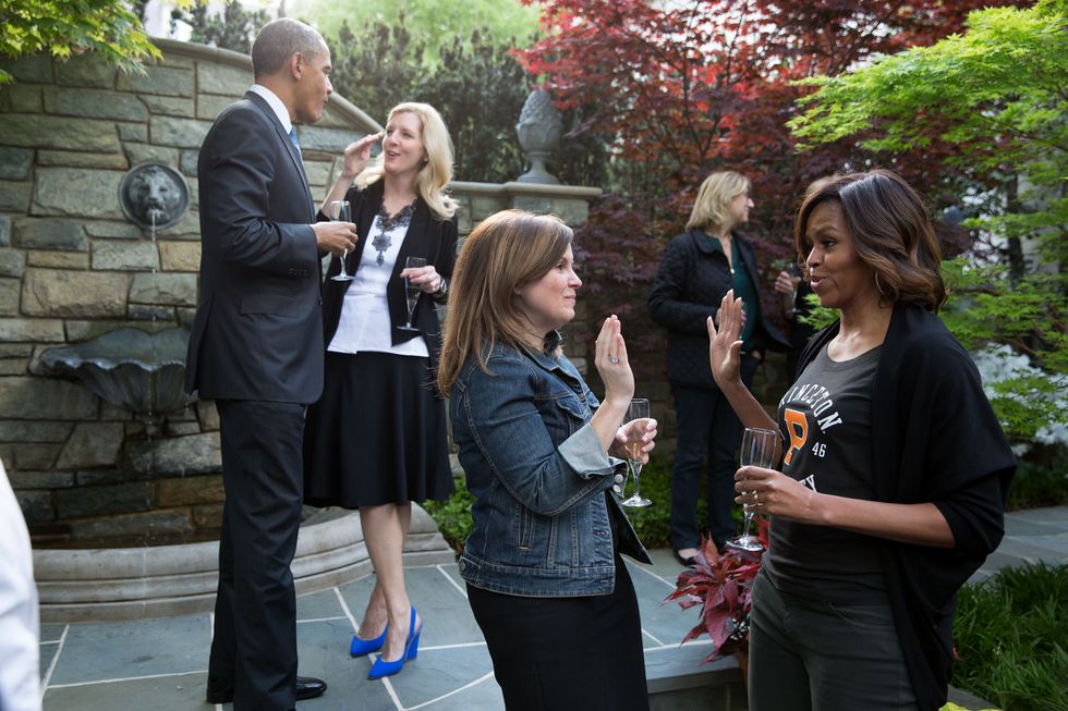 The author at a White House cocktail party with the Obamas