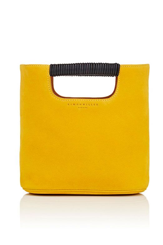 <p>Trend-driven accessories are best done small. Carry your yellow to off-duty events this season.</p><p><em data-redactor-tag="em" data-verified="redactor">Simon Miller Birch Mini Tote Bag, $435; </em><a href="http://www.barneys.com/product/simon-miller-birch-mini-tote-bag-505014841.html" target="_blank" data-tracking-id="recirc-text-link"><em data-redactor-tag="em" data-verified="redactor">barneys.com</em></a></p>