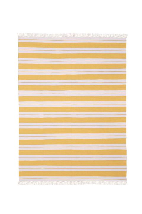 <p>Your private space feels sunnier, regardless of the forecast, with fresh stripes.</p><p><em data-redactor-tag="em" data-verified="redactor">Pottery Barn Recycled Yarn Rug, $159; </em><a href="http://www.potterybarn.com/products/kilner-stripe-rug-yellow/?pkey=e%7Cyellow%7C28%7Cbest%7C0%7C1%7C48%7C%7C4&amp;sku=5326806&amp;group=1&amp;cm_src=PRODUCTSEARCH" target="_blank" data-tracking-id="recirc-text-link"><em data-redactor-tag="em" data-verified="redactor">potterybarn.com</em></a></p>