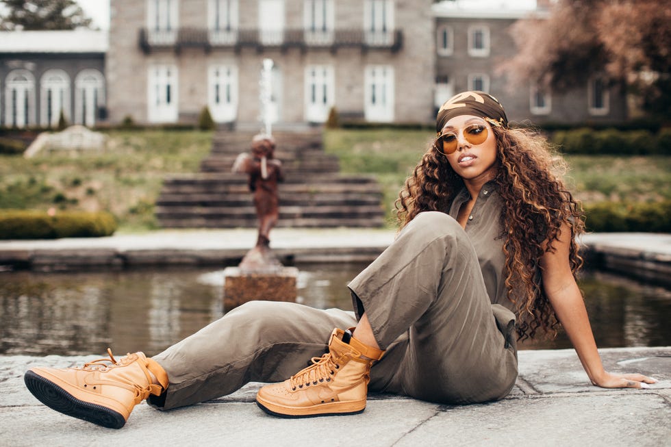 Photograph, Street fashion, Footwear, Beauty, Shoe, Sitting, Fashion, Human leg, Yellow, Leg, 