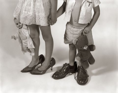 kids legs in grown up shoes