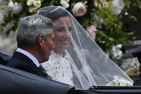 Bridal veil, Veil, Photograph, Bridal clothing, Happy, Formal wear, Facial expression, Suit, Tradition, Wedding dress, 