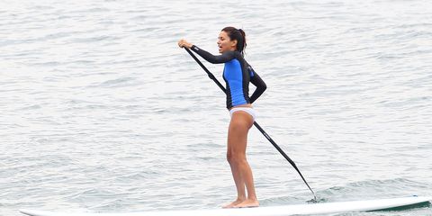 Eva Longoria paddleboarding