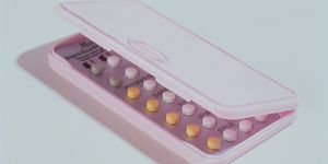 birth control pills in a pink box