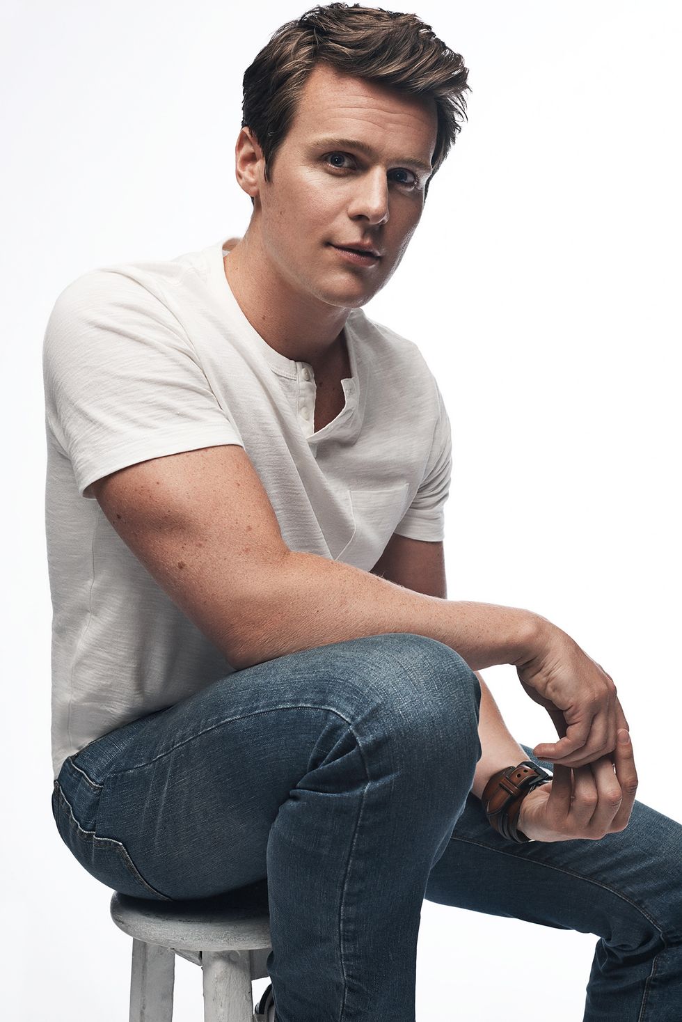 Sitting, Jeans, Cheek, Arm, Cool, Model, Neck, Muscle, Photo shoot, Photography, 