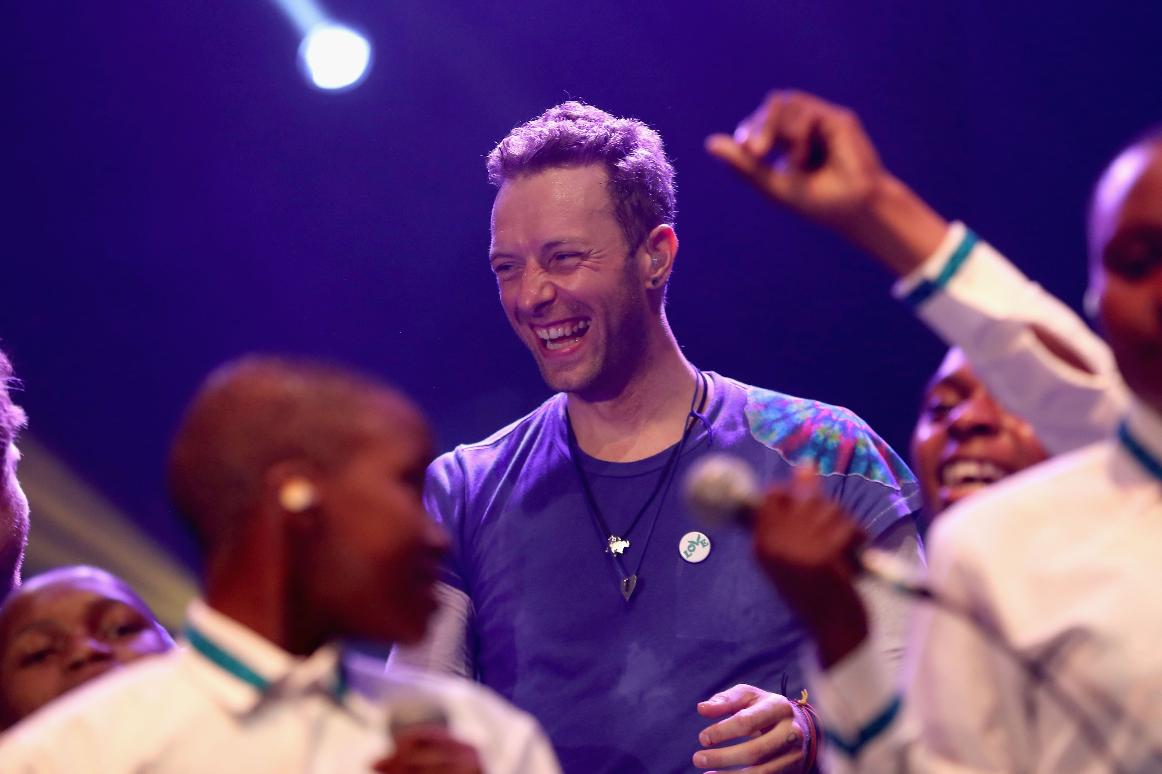 A History of Chris Martin s Most Beloved Tie Dye T Shirt