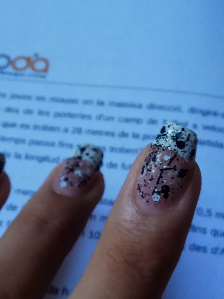 This Student Uses Long Nails to Hide Physics Equations