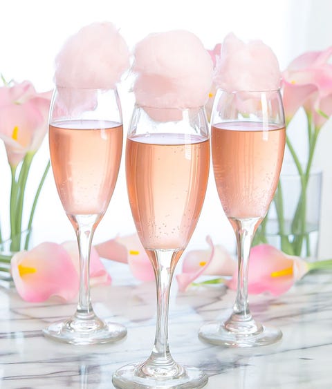 Cotton Candy Champagne Cocktails <p>Okay, so this is basically just a fancy cocktail, but you have to admit that cotton candy dipped in champagne sounds pretty irresistible! Although you can make this special drink with any <a href="http://www.elledecor.com/life-culture/food-drink/g3387/champagne-cocktails/" target="_blank">sparkling wine</a>, we recommend rosé champagne because, duh!</p><p><em data-redactor-tag="em"><a href="http://kirbiecravings.com/2016/07/cotton-candy-champagne-cocktails.html" target="_blank">Via Kirbie's Cravings</a></em></p>