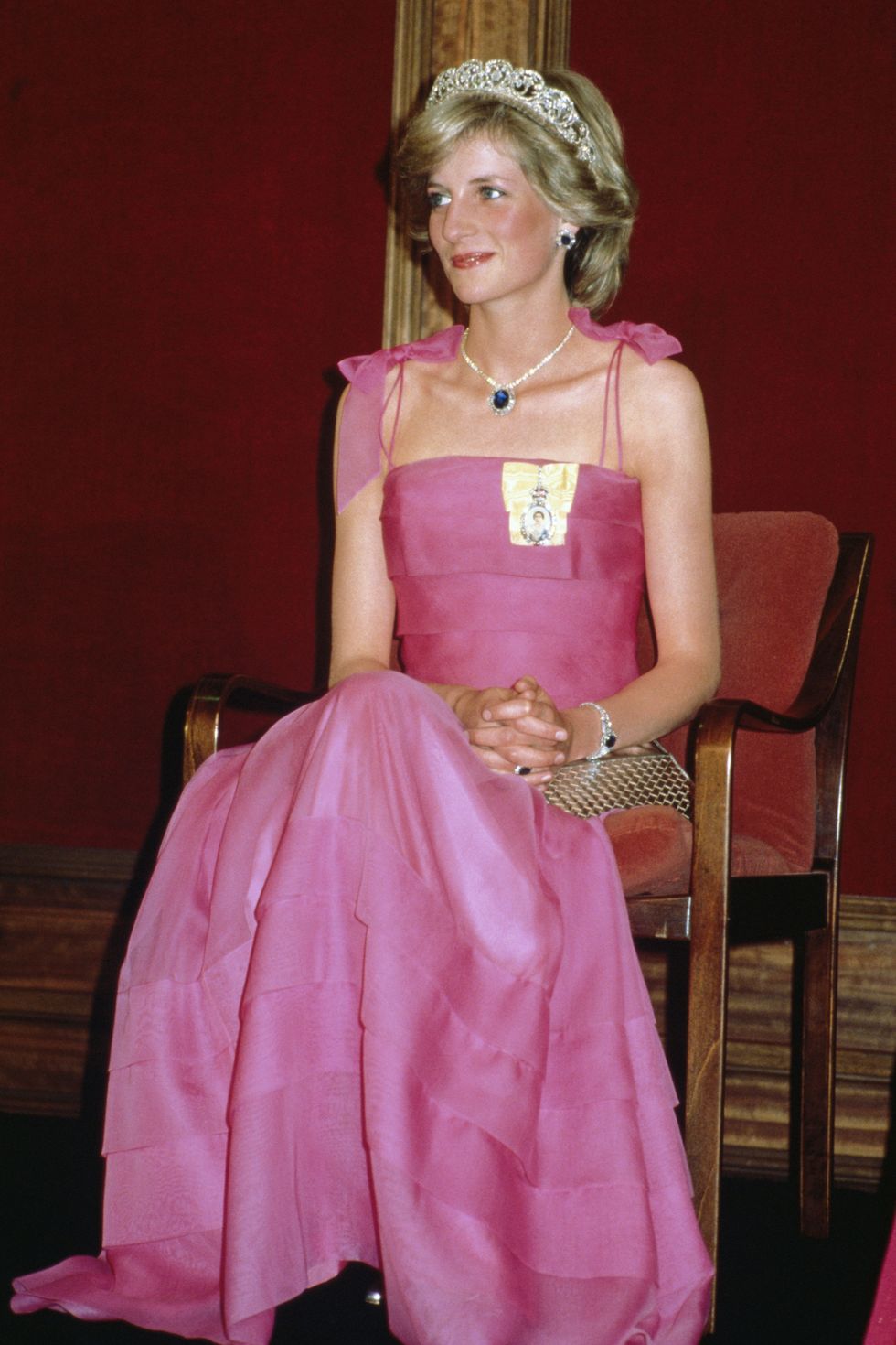 <p>A princess wearing pink doesn't seem like anything revolutionary, but this outfit&nbsp;just further solidified&nbsp;Diana's reputation as an icon. Many royals wear gloves at formal events, but Diana never did because she felt it made her&nbsp;<a href="http://www.goodhousekeeping.com/beauty/fashion/g4362/princess-diana-dresses/?slide=3&amp;thumbnails=" target="_blank" data-tracking-id="recirc-text-link">closer to the people</a>.&nbsp;</p><p><strong data-redactor-tag="strong" data-verified="redactor">RELATED: </strong><a href="http://www.redbookmag.com/life/a46898/prince-harry-elton-john-princess-diana/" target="_blank" data-tracking-id="recirc-text-link"><strong data-redactor-tag="strong" data-verified="redactor">Elton John Thinks Prince Harry Is Just Like Princess Diana</strong></a></p>