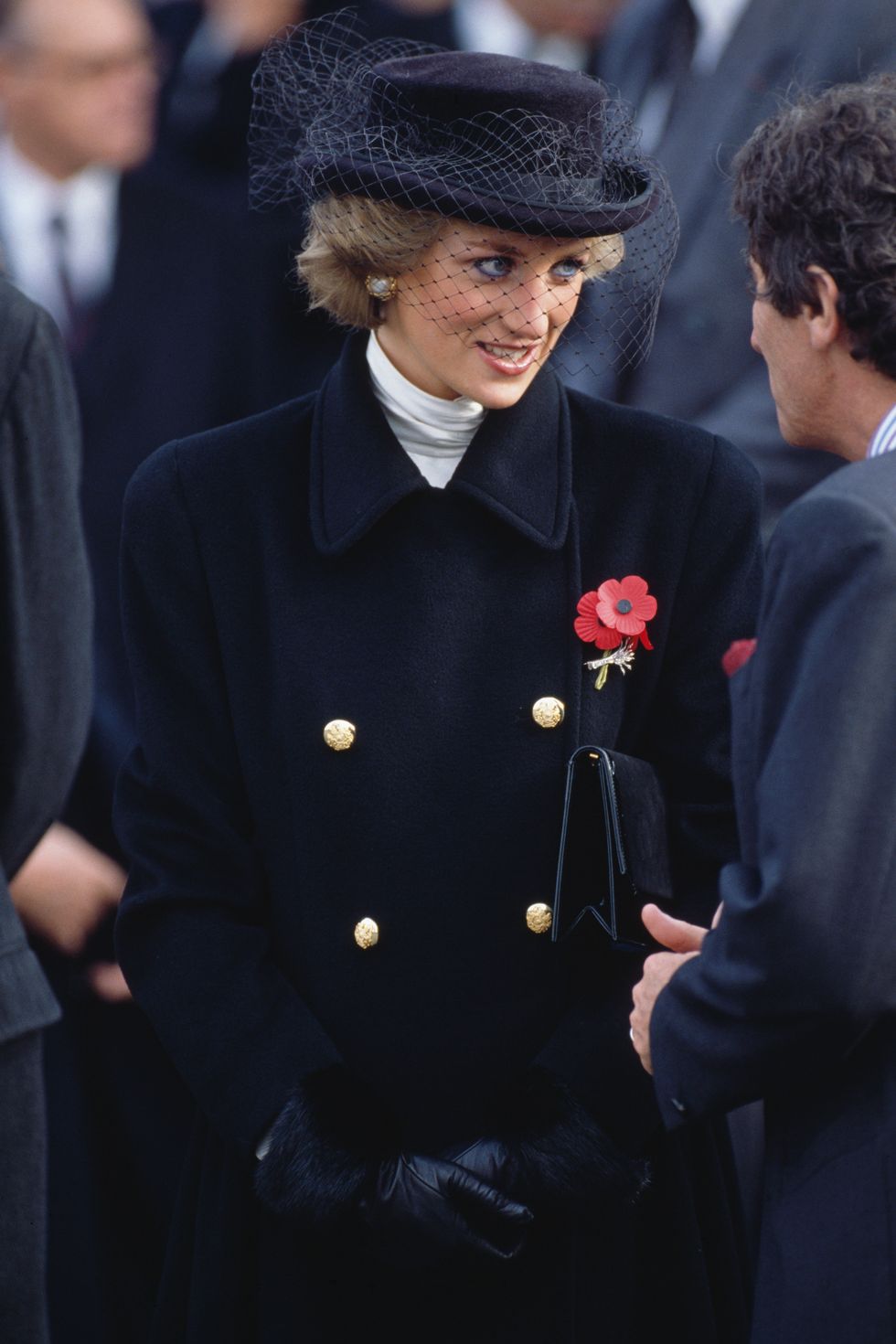 <p>Princess Diana attended the&nbsp;Remembrance Day ceremonies in a more somber look — but the birdcage veil&nbsp;still makes it stand out.&nbsp;<br></p><p><strong data-redactor-tag="strong" data-verified="redactor">RELATED: </strong><a href="http://www.redbookmag.com/fashion/g4449/kate-middleton-style-makeup-hair-products/" target="_blank" data-tracking-id="recirc-text-link"><strong data-redactor-tag="strong" data-verified="redactor">Exactly Where to Buy 21 of Kate Middleton's Favorite Products</strong></a></p>