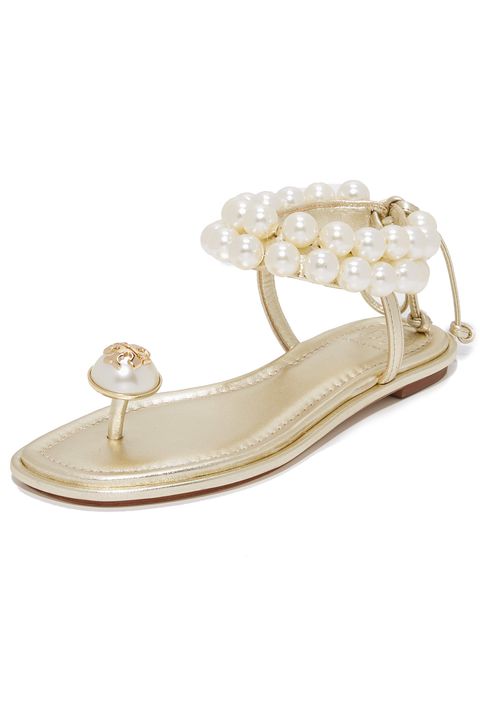 <p>A classic sandal shape is cocktail hour-ready with the addition&nbsp;of gumball-sized pearls.</p><p><em data-redactor-tag="em" data-verified="redactor">Tory Burch Melody Ankle Strap Sandals, $325; </em><a href="https://www.shopbop.com/melody-ankle-strap-sandals-tory/vp/v=1/1512738172.htm?folderID=13441&amp;fm=other-shopbysize-viewall&amp;os=false&amp;colorId=11739" target="_blank" data-tracking-id="recirc-text-link"><em data-redactor-tag="em" data-verified="redactor">shopbop.com</em></a></p>