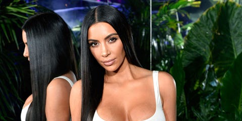 Kim Kardashian Wears a Tiny Sports Bra and Sparkly Skirt to the Balmain Party