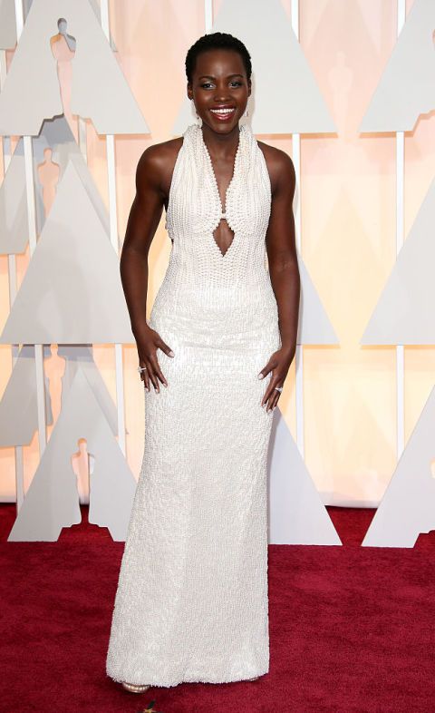<p>In 2015, Nyong'o<span class="redactor-invisible-space" data-verified="redactor" data-redactor-tag="span" data-redactor-class="redactor-invisible-space"></span> looked like a dream in a long, white Calvin Klein gown that featured roughly 6,000 pearls. The showstopper <a href="http://fortune.com/2015/02/23/lupita-nyongo-oscar-dress/" target="_blank" data-tracking-id="recirc-text-link">was estimated to cost $150,000</a>.&nbsp;</p><p><strong data-redactor-tag="strong" data-verified="redactor">Shop a&nbsp;similar look:</strong><span class="redactor-invisible-space" data-verified="redactor" data-redactor-tag="span" data-redactor-class="redactor-invisible-space" style="background-color: initial;" rel="background-color: initial;" data-redactor-style="background-color: initial;">&nbsp;White cutout gown, $378, <a href="http://www.saksfifthavenue.com/main/ProductDetail.jsp" target="_blank" data-tracking-id="recirc-text-link">saksfifthavenue.com</a></span></p>