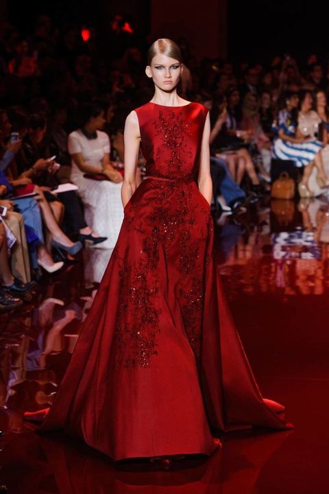 Clothing, Human body, Shoulder, Dress, Red, Fashion show, Gown, Fashion model, Style, Formal wear, 