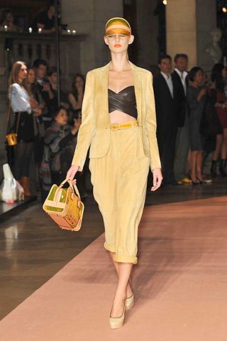 Clothing, Footwear, Brown, Yellow, Shoulder, Fashion show, Outerwear, Runway, Style, Formal wear, 