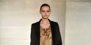 Clothing, Leg, Brown, Sleeve, Shoulder, Fashion show, Joint, Outerwear, Style, Formal wear, 
