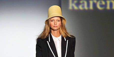 Clothing, Brown, Sleeve, Hat, Shoulder, Fashion show, Joint, Outerwear, Style, Fashion model, 