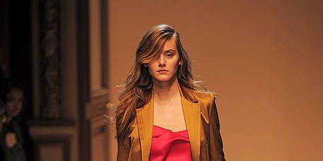 Clothing, Footwear, Leg, Brown, Fashion show, Shoulder, Joint, Runway, Outerwear, Style, 