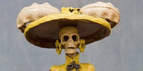 Yellow, Jaw, Amber, Sculpture, Temple, Skull, Bone, Bronze sculpture, Anthropology, Figurine, 