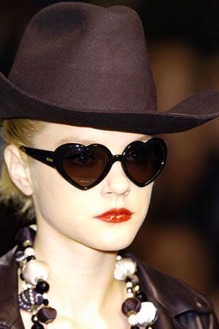 Eyewear, Vision care, Glasses, Lip, Hat, Brown, Chin, Fashion accessory, Sunglasses, Style, 