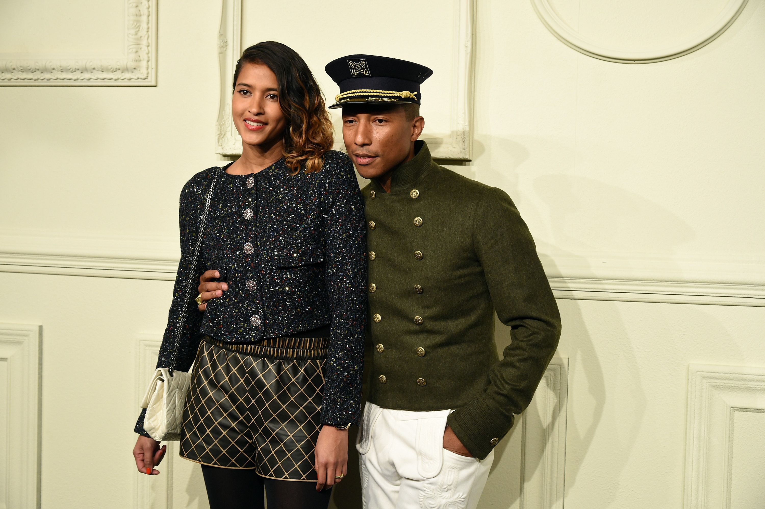 Pharrell Williams is joined by his wife Helen and son Rocket for a