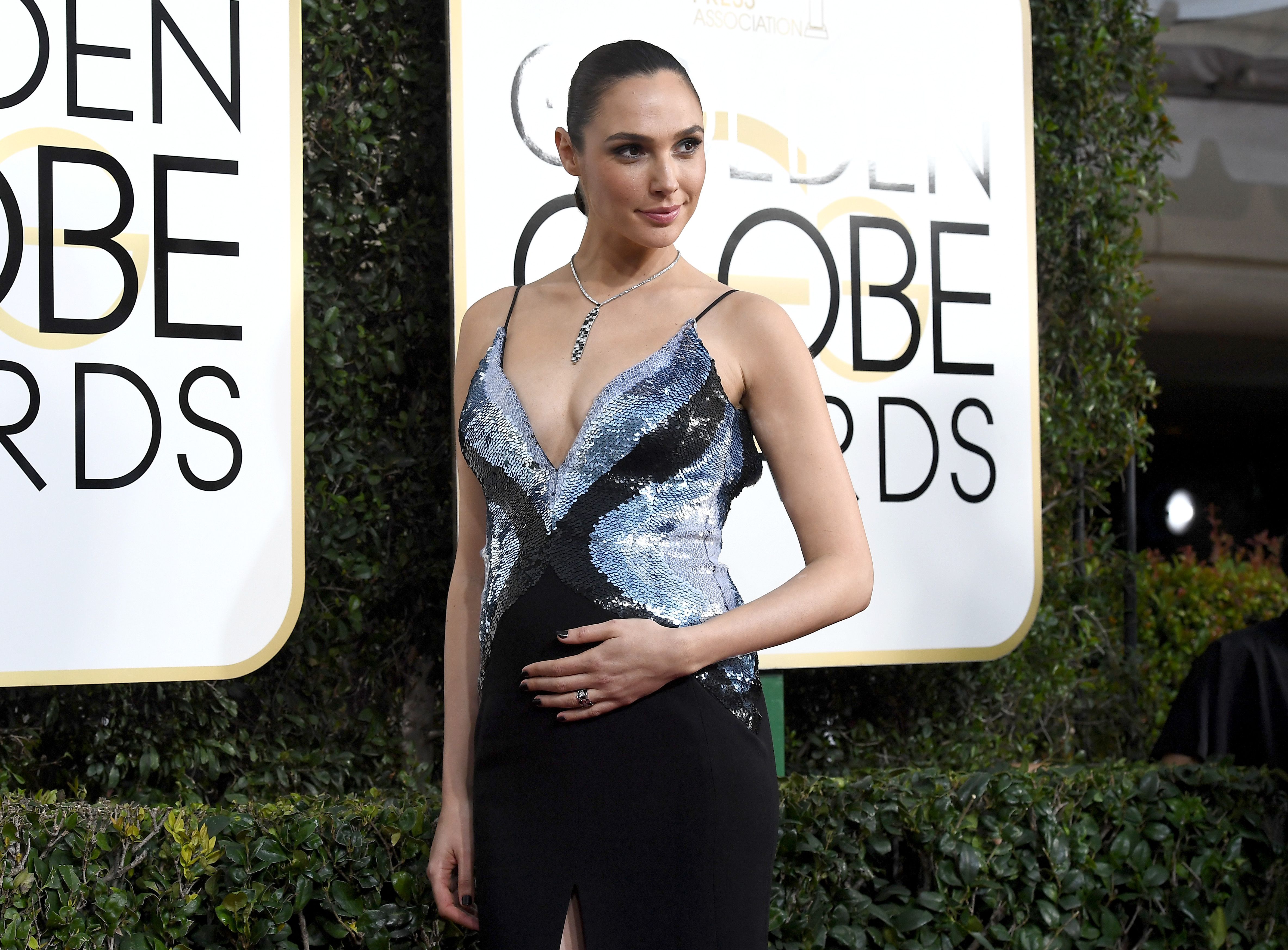 depict Actress Gal Gadot in the pregnant wonder woma