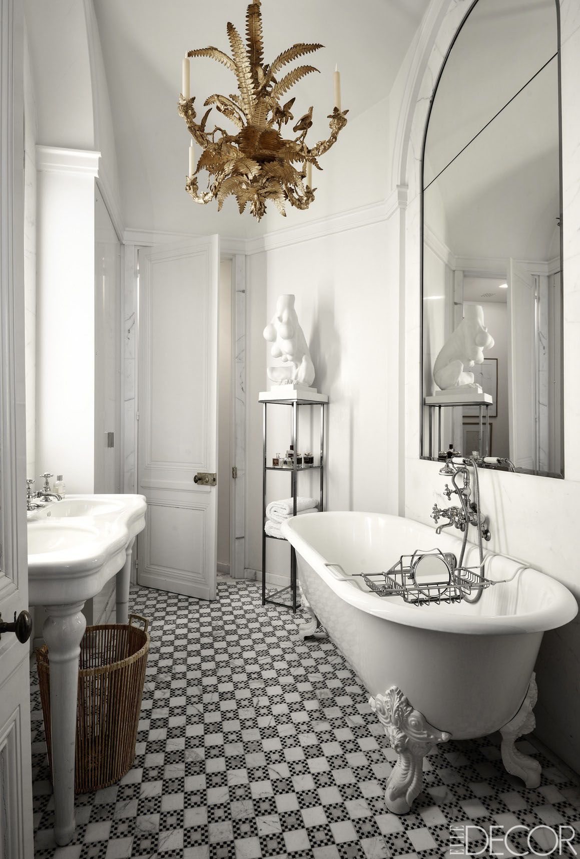 Elegant black and white bathroom with chandelier