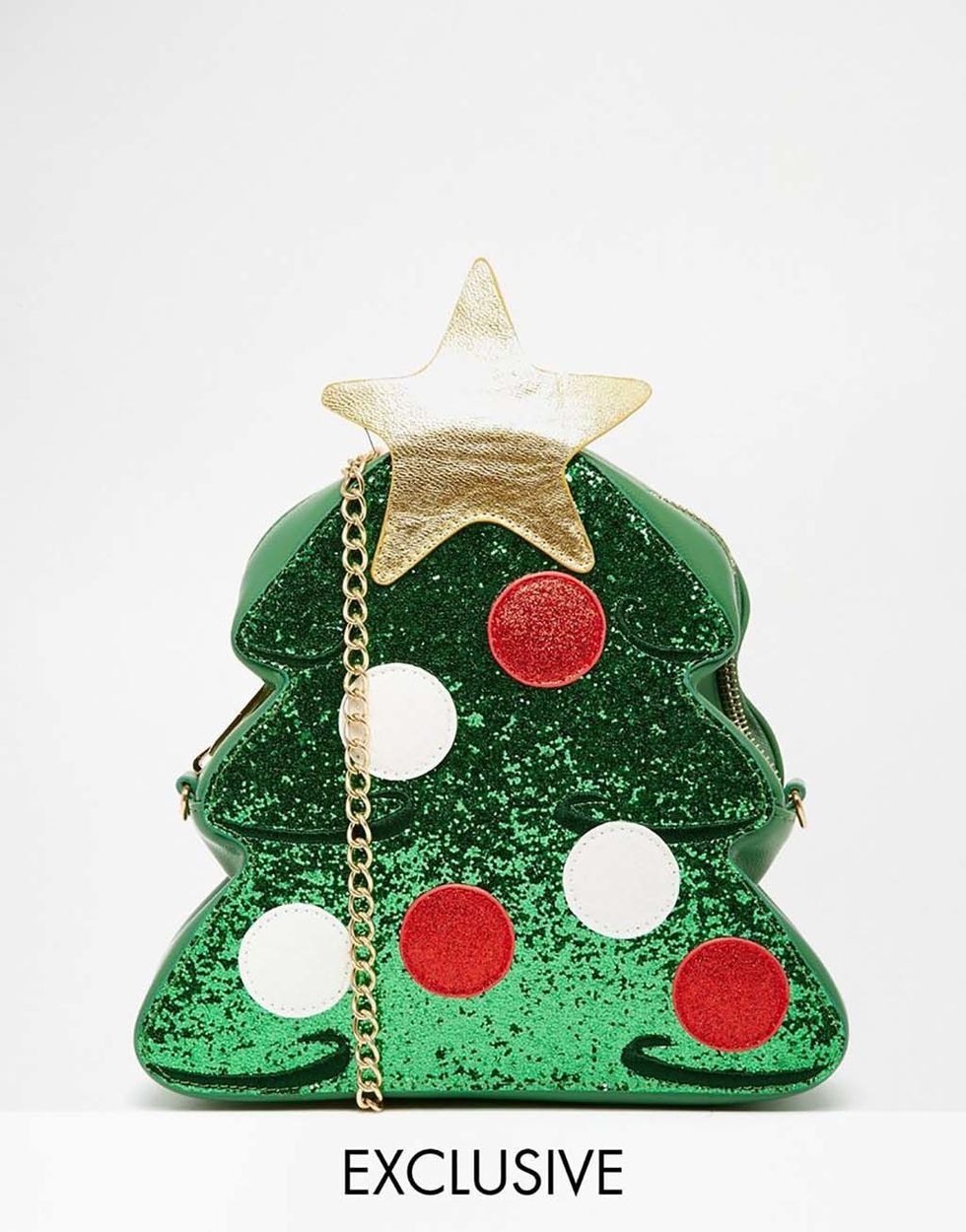 <p>Bolsito con forma de árbol navideño con bandolera de cadena, de&nbsp;<strong>Skinny Dip&nbsp;</strong>(45 €).</p>